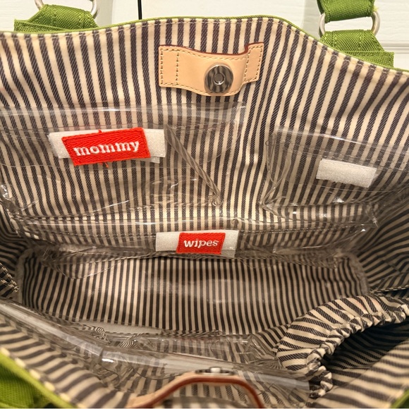Danzo Diaper Bag in Green and tan with multiple compartments inside - Picture 8 of 11